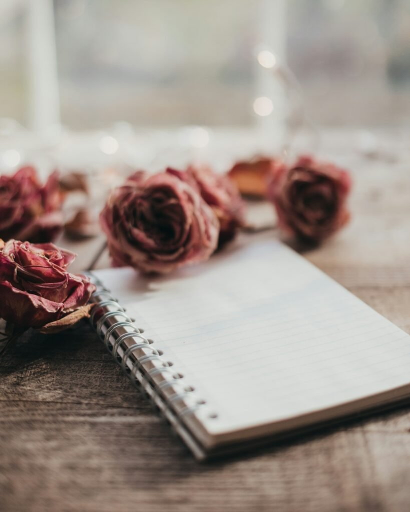 Notebook with dried roses